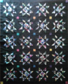 Custom quilt in Amish Stars pattern