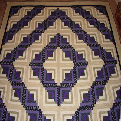 Custom quilt in Log Cabin pattern